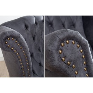 Fauteuil design Chesterfield coloris gris capitonné Fauteuil design Chesterfield coloris gris capitonné