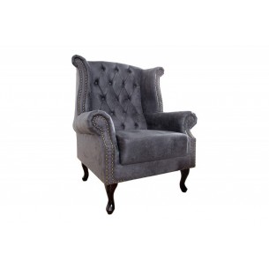 Fauteuil design Chesterfield coloris gris capitonné Fauteuil design Chesterfield coloris gris capitonné